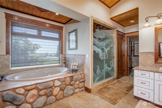 bathroom with vanity, shower with separate bathtub, tile patterned flooring, and wood ceiling