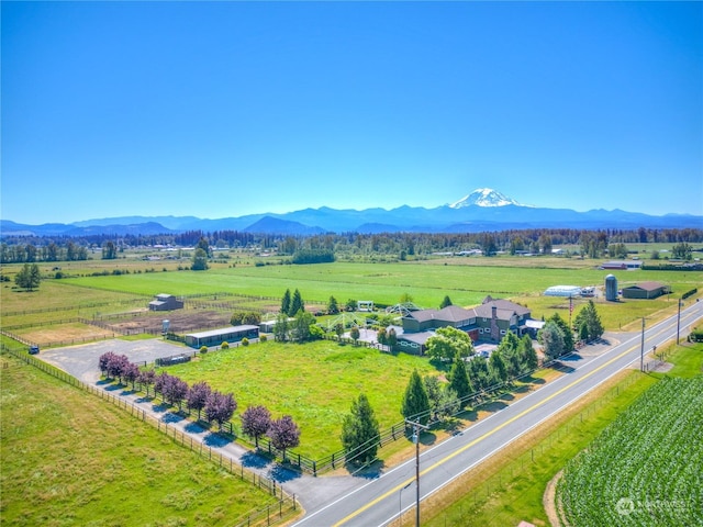 drone / aerial view with a mountain view and a rural view