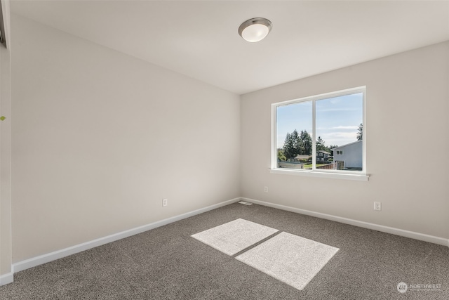 view of carpeted spare room