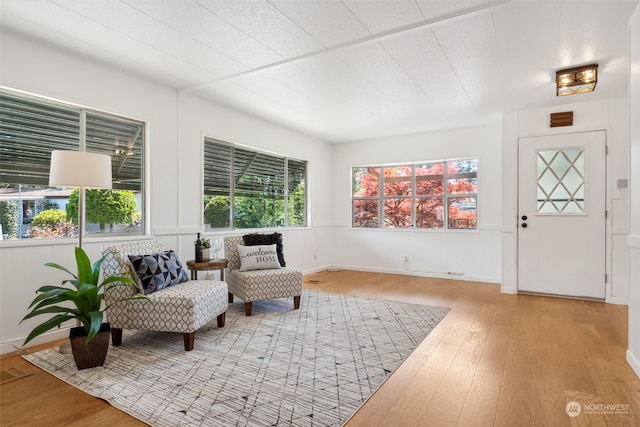 sitting room with light hardwood / wood-style floors