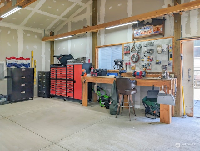 garage with a workshop area