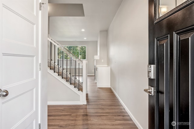 foyer entrance with wood-type flooring