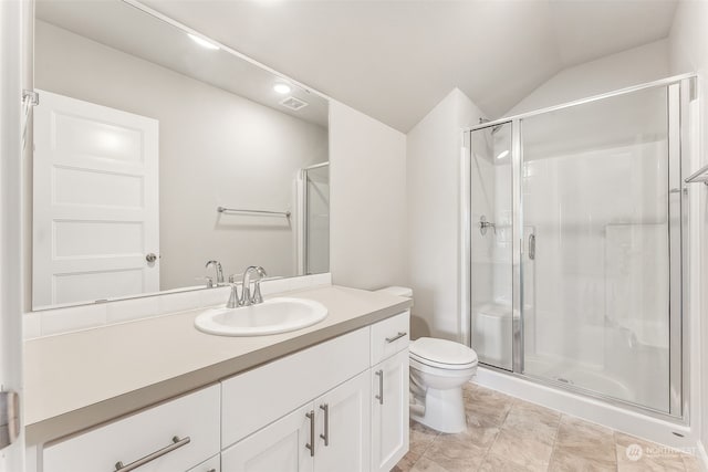 bathroom featuring lofted ceiling, a shower with shower door, vanity, and toilet