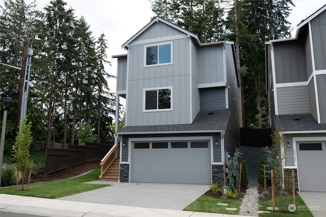 view of front of home with a garage