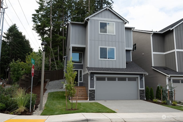 view of front of property with a garage