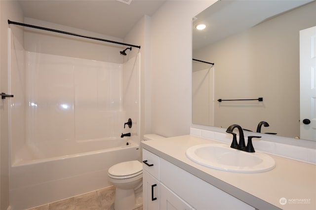 full bathroom with shower / washtub combination, vanity, toilet, and tile patterned floors