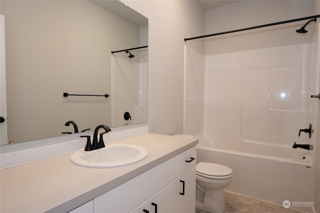 full bathroom with tile patterned flooring, shower / tub combination, vanity, and toilet