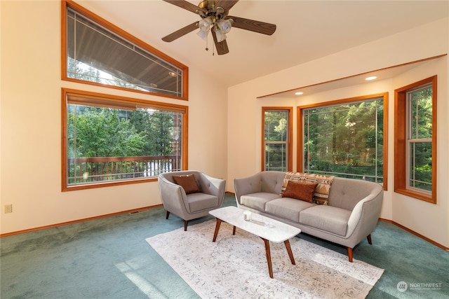 sunroom with a wealth of natural light, ceiling fan, and lofted ceiling