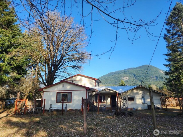 112 Combs Rd, Packwood, WA 98361 - rear view of house with a mountain view