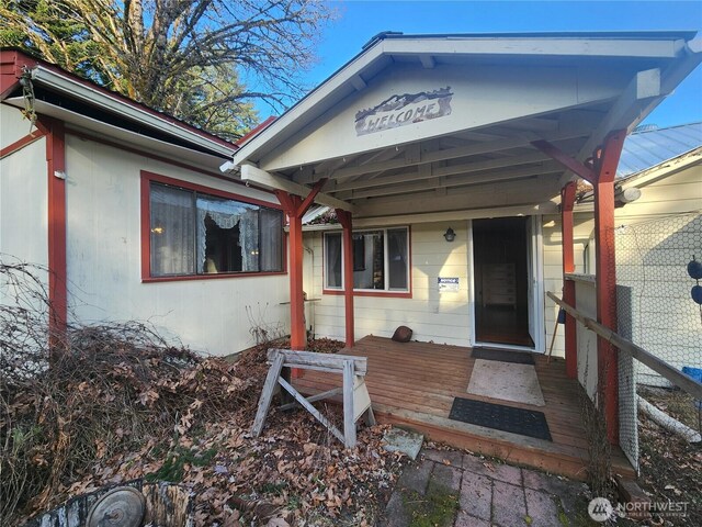 112 Combs Rd, Packwood, WA 98361 - doorway to property with a wooden deck