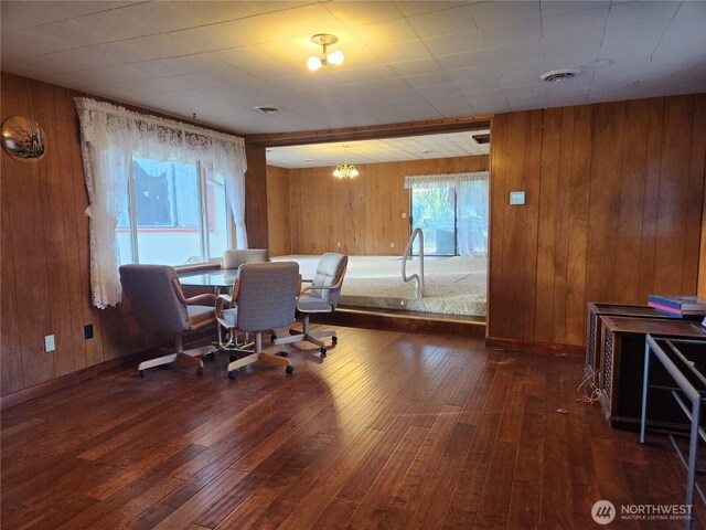 112 Combs Rd, Packwood, WA 98361 - home office with visible vents, wood walls, and hardwood / wood-style flooring