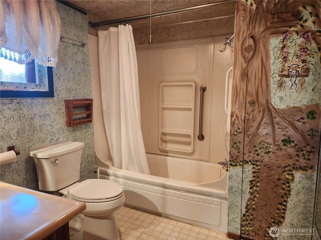 112 Combs Rd, Packwood, WA 98361 - bathroom featuring tile patterned floors, shower / tub combo, and toilet