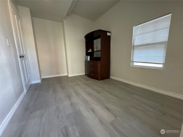 unfurnished room featuring light wood-type flooring