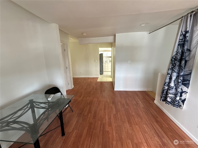 hall featuring wood-type flooring