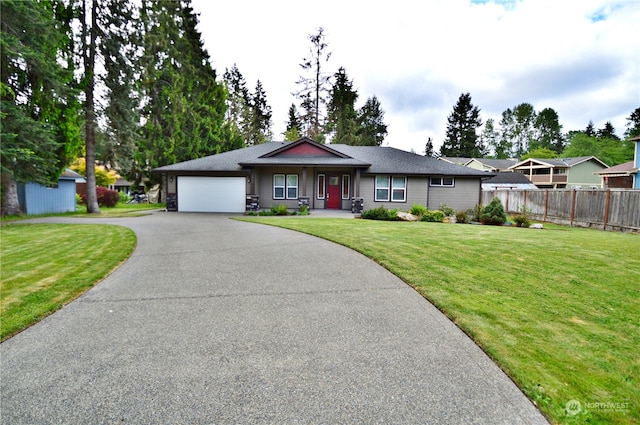 single story home featuring a garage, central AC, and a front lawn