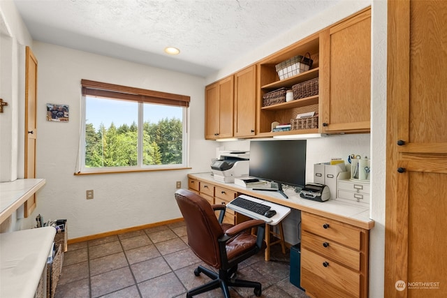 office space featuring a textured ceiling