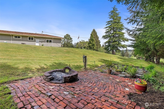 view of patio featuring a fire pit