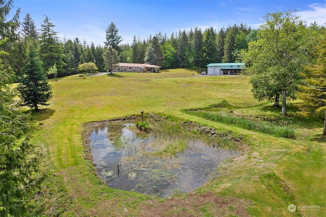 drone / aerial view with a water view