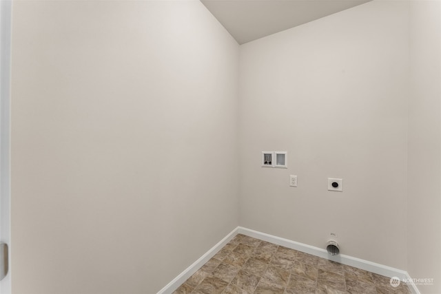 laundry area featuring electric dryer hookup and washer hookup