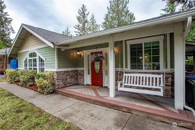 entrance to property with covered porch