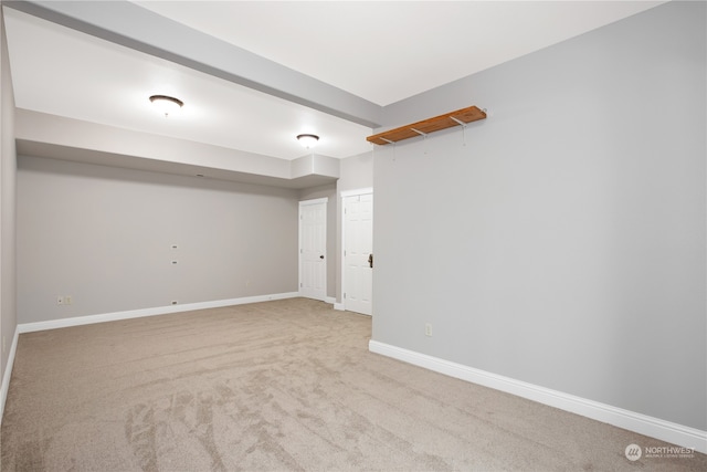 basement with carpet flooring