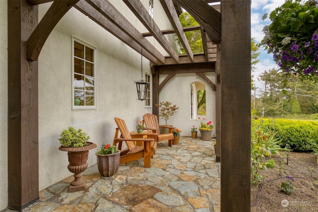 view of patio / terrace featuring a pergola