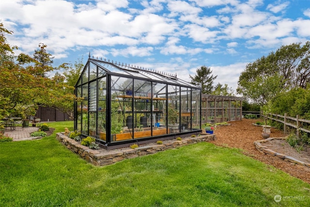 view of outdoor structure featuring a yard