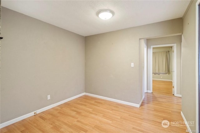 empty room featuring light wood-type flooring