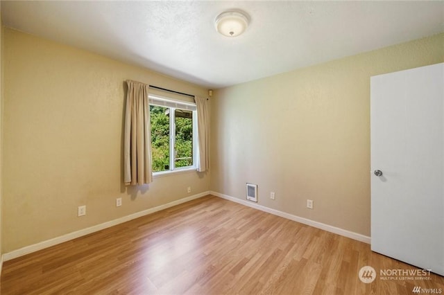 empty room featuring light wood-type flooring