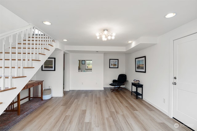 unfurnished room with light hardwood / wood-style flooring