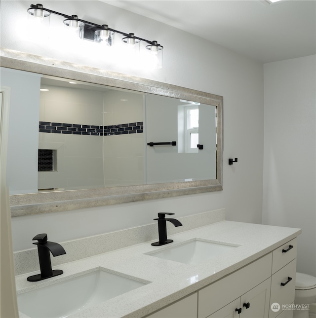 410 Summer Pl SW, Mattawa, WA 99349 - bathroom with dual sinks, oversized vanity, and toilet