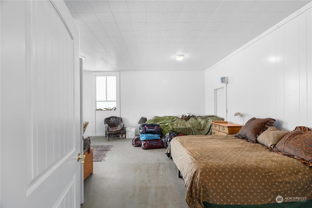 bedroom with crown molding