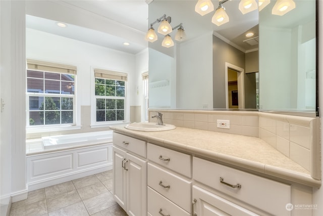 bathroom with a bath, tile patterned floors, crown molding, decorative backsplash, and vanity