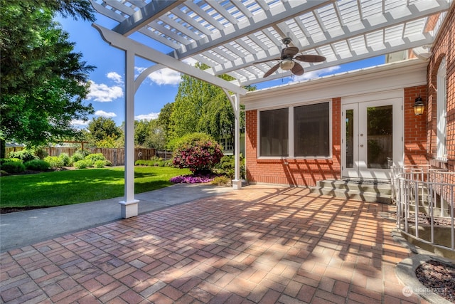 view of patio featuring ceiling fan and a pergola