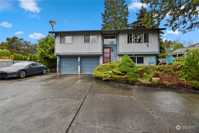 bi-level home featuring a garage