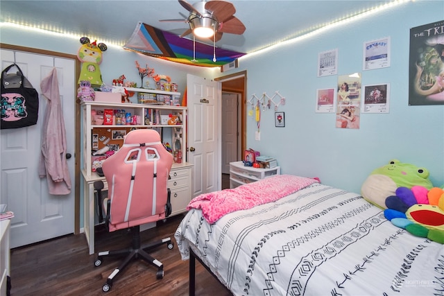 bedroom featuring ceiling fan and dark hardwood / wood-style floors