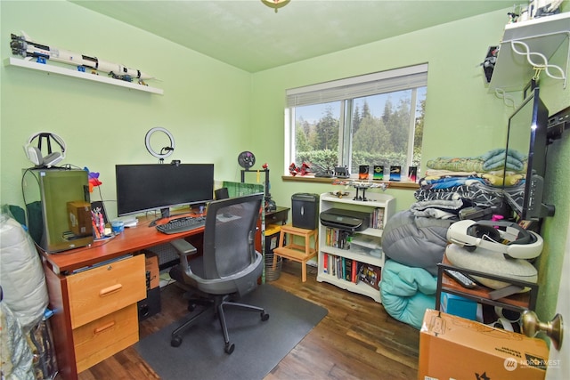 home office with dark wood-type flooring