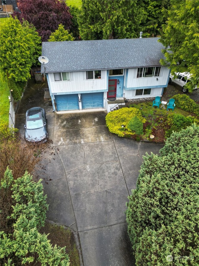 split foyer home featuring a garage