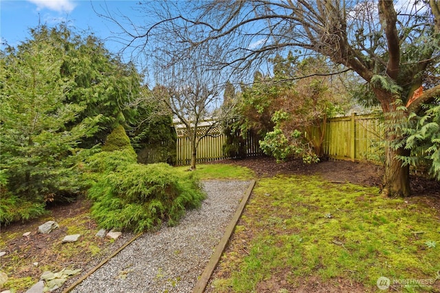 view of yard with fence