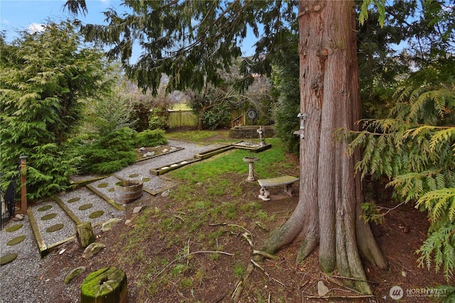 view of yard with fence