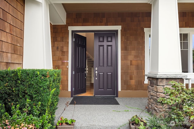 doorway to property with a porch