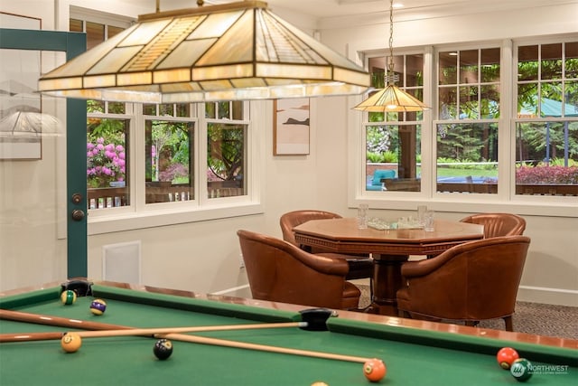 rec room with a wealth of natural light, crown molding, and pool table