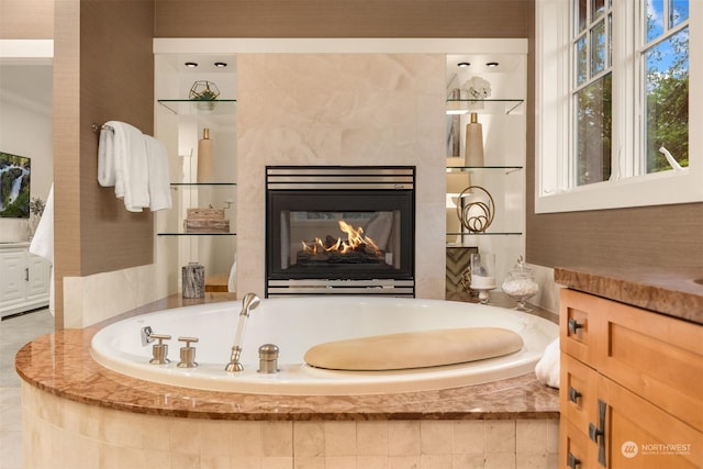 bathroom with tiled bath