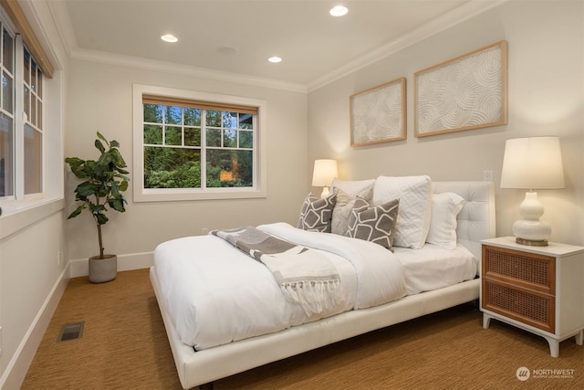 carpeted bedroom with crown molding