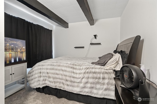 carpeted bedroom featuring beamed ceiling