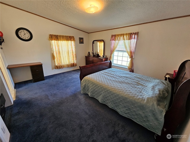 bedroom featuring ornamental molding, dark colored carpet, a textured ceiling, and lofted ceiling