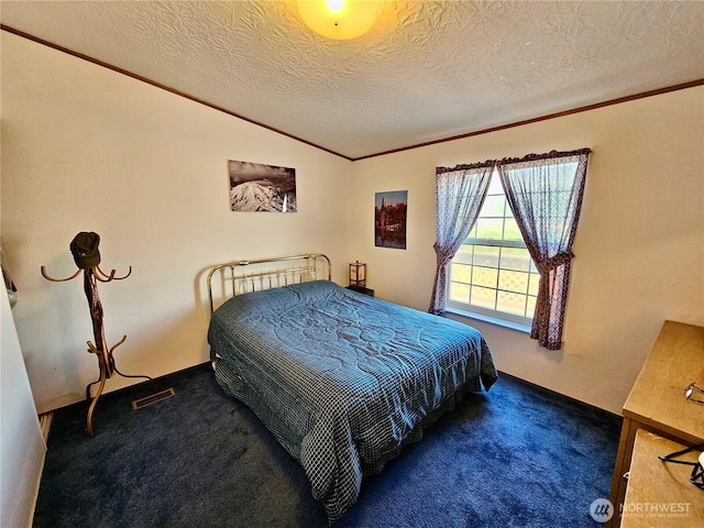 12 Moonlight Dr, Oroville, WA 98844 - bedroom with carpet flooring, ornamental molding, a textured ceiling, and lofted ceiling