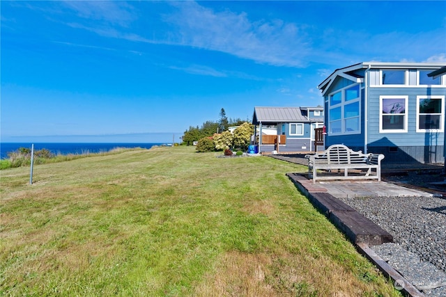 view of yard with a water view