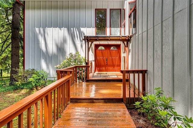 doorway to property with a deck