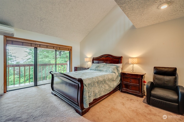 carpeted bedroom with a textured ceiling, access to exterior, vaulted ceiling, and a wall mounted air conditioner